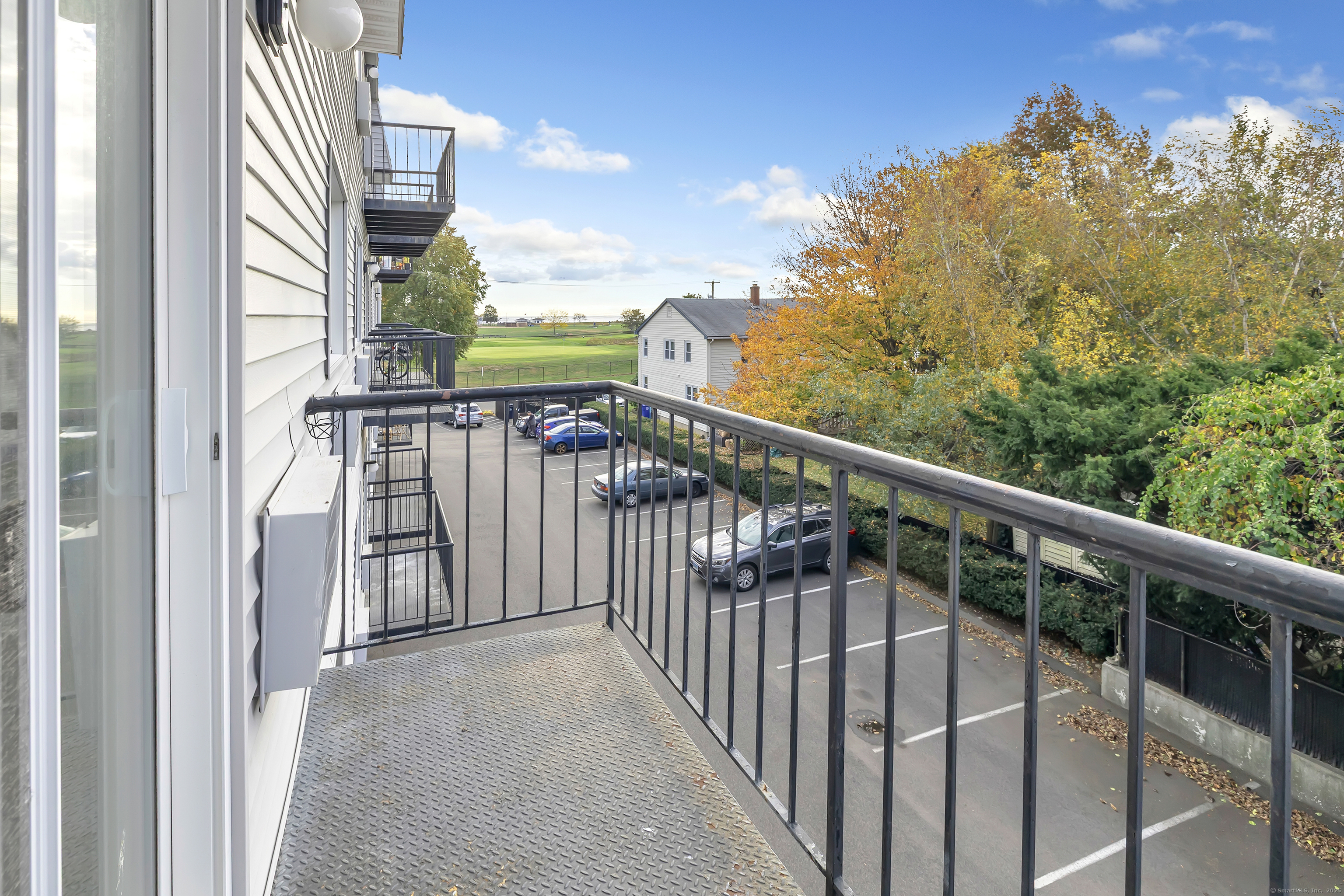 155 Short Beach Road, Unit 209 Stratford, CT 06615 - Photo 13 of 22 a view of balcony with staircase