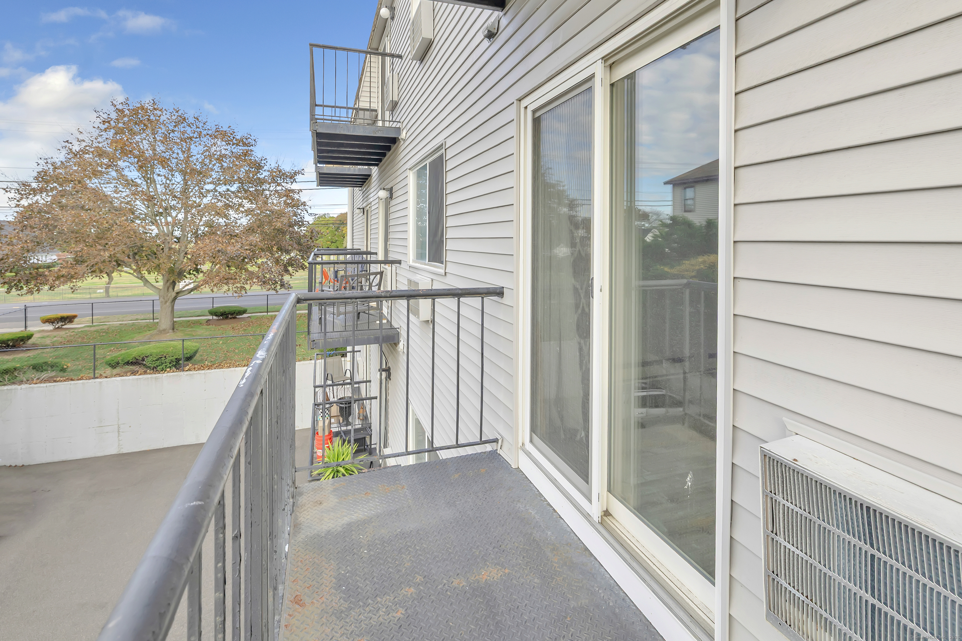155 Short Beach Road, Unit 209 Stratford, CT 06615 - Photo 14 of 22 a view of outdoor space and deck