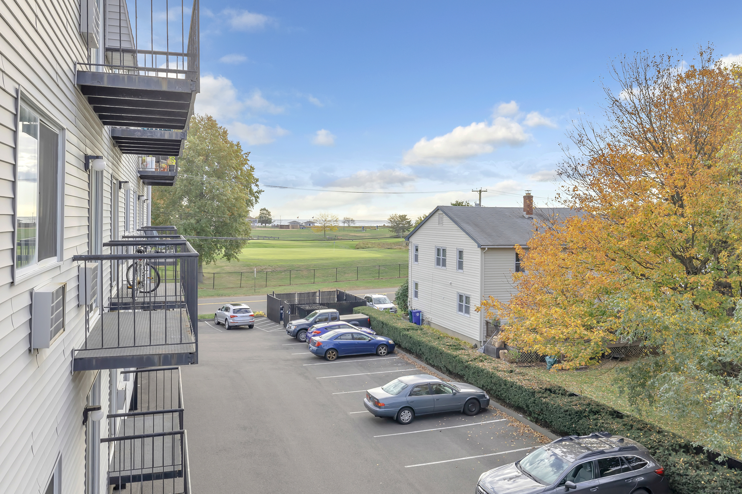 155 Short Beach Road, Unit 209 Stratford, CT 06615 - Photo 9 of 22 a car parked on the side of the road