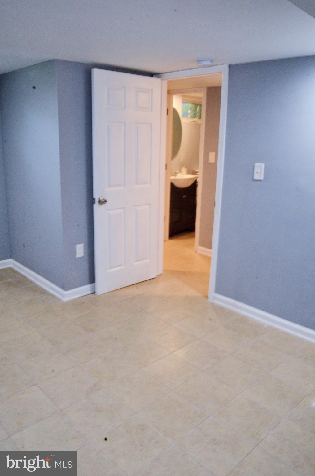1368 Pentwood Road Baltimore, MD 21239 - Photo 9 of 18 Fourth Bedroom