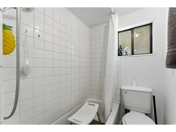 a bathroom with a toilet and a sink