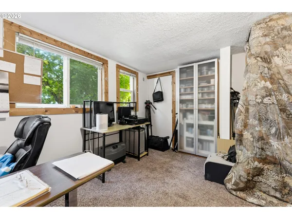 a room with furniture and a window