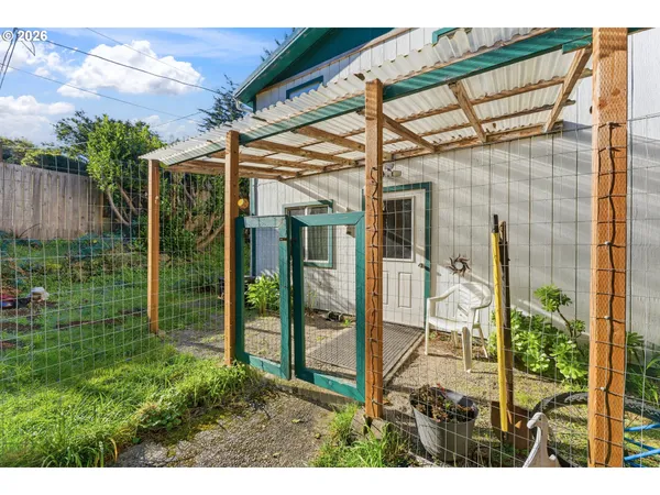 a view of a backyard with garden