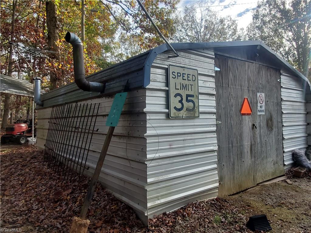 1346 Academy Rd Extension Franklinville, NC 27248 - Photo 13 of 16 side view of wired bldg with 220 amp service