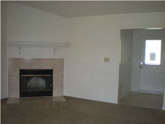 2835 Old Mill Way Crestview, FL 32539 - Photo 2 of 25 a living room with a fireplace