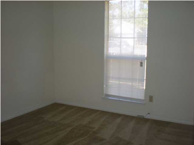 2835 Old Mill Way Crestview, FL 32539 - Photo 12 of 25 an empty room with a window