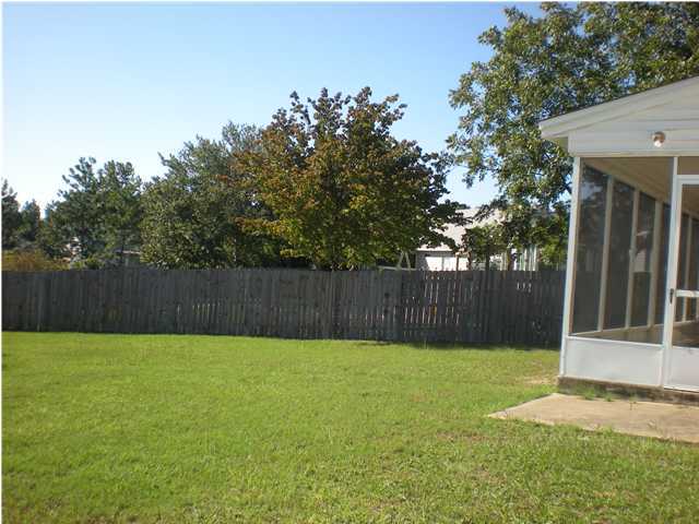 2835 Old Mill Way Crestview, FL 32539 - Photo 22 of 25 a bathroom with a sink and a yard