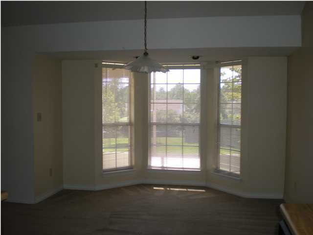 2835 Old Mill Way Crestview, FL 32539 - Photo 6 of 25 a view of an empty room with a window