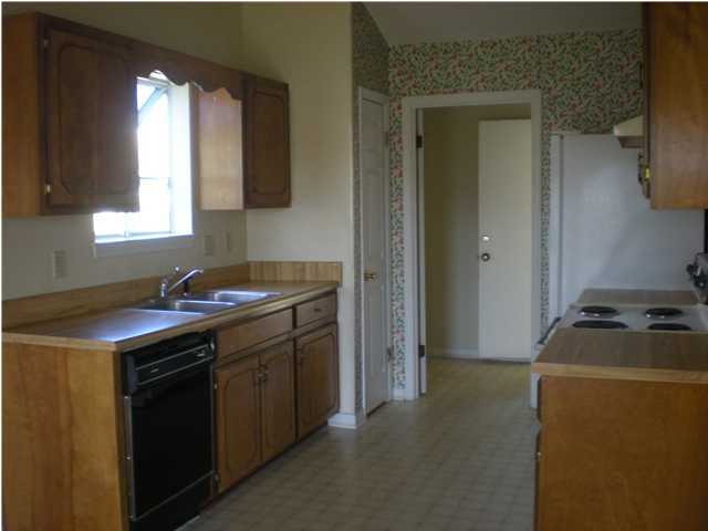 2835 Old Mill Way Crestview, FL 32539 - Photo 7 of 25 a utility room with closet a stove and a window