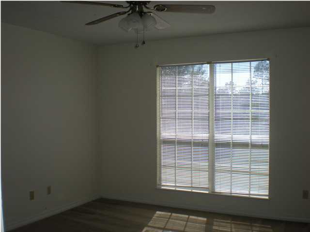 2835 Old Mill Way Crestview, FL 32539 - Photo 9 of 25 an empty room with a window