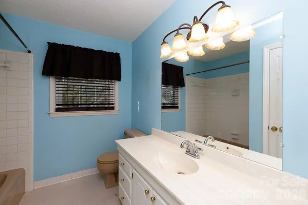 a view of a bathroom with a bathtub