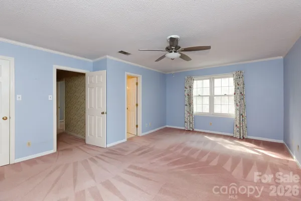 a view of an empty room and window