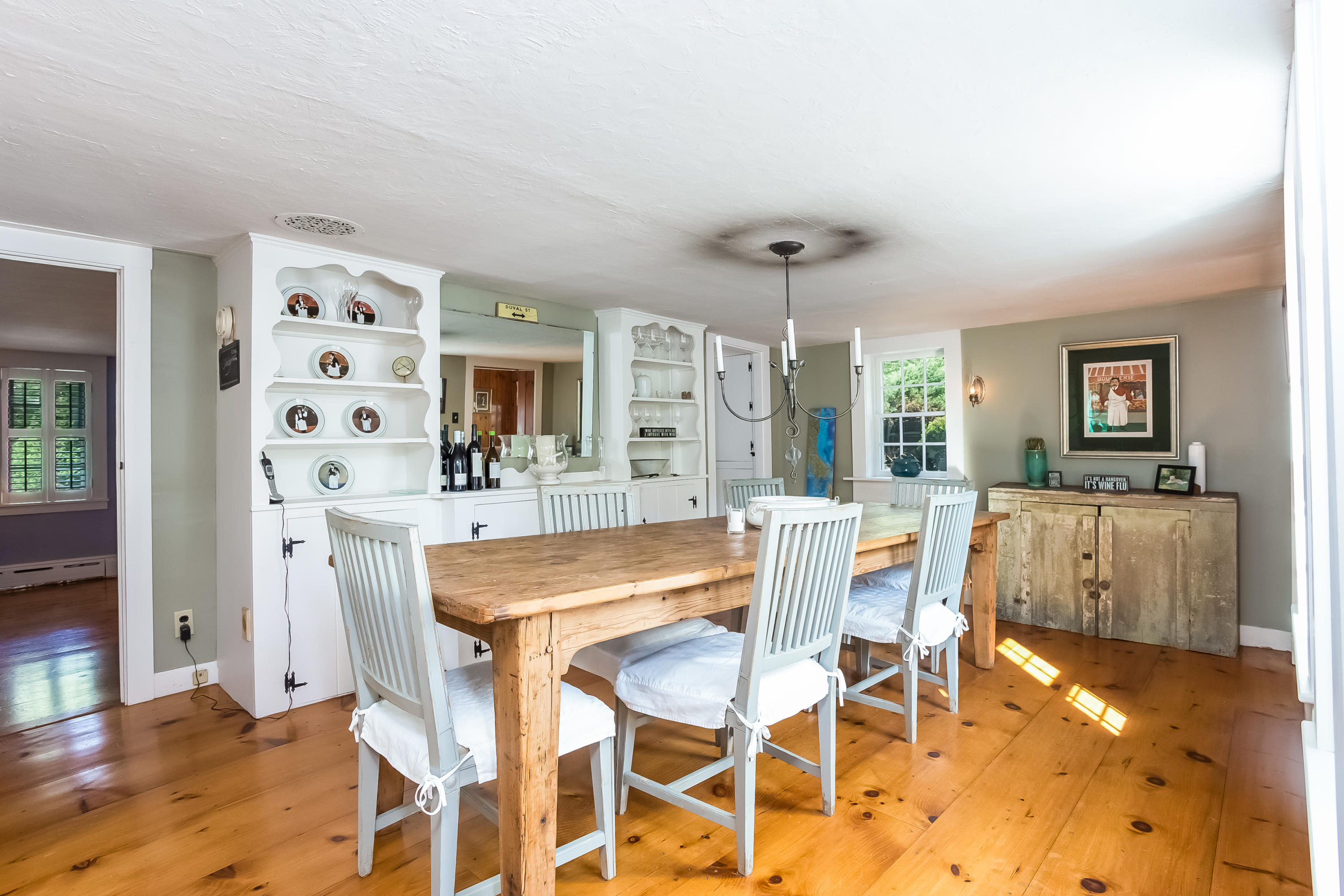 1189 County Road Cataumet, MA 02534 - Photo 8 of 25 a view of a dining room with furniture and wooden floor