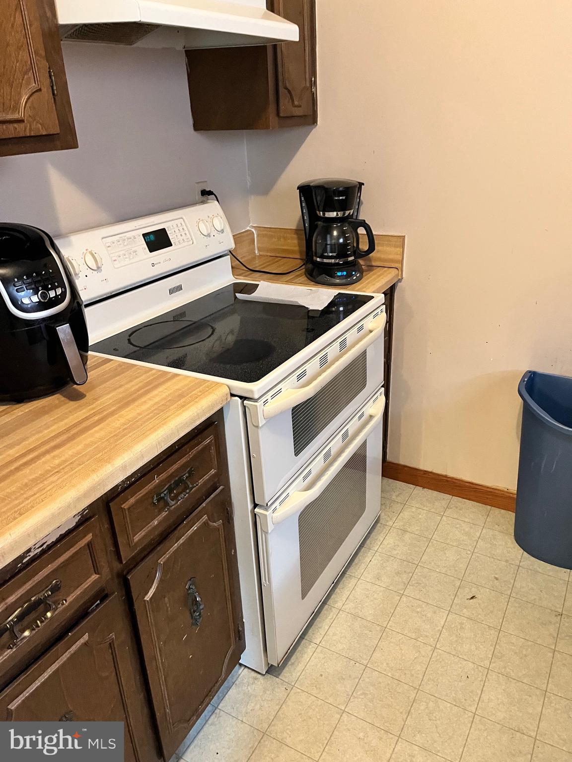 2166 Country Road Maysville, WV 26833 - Photo 13 of 54 a kitchen with a stove and a microwave
