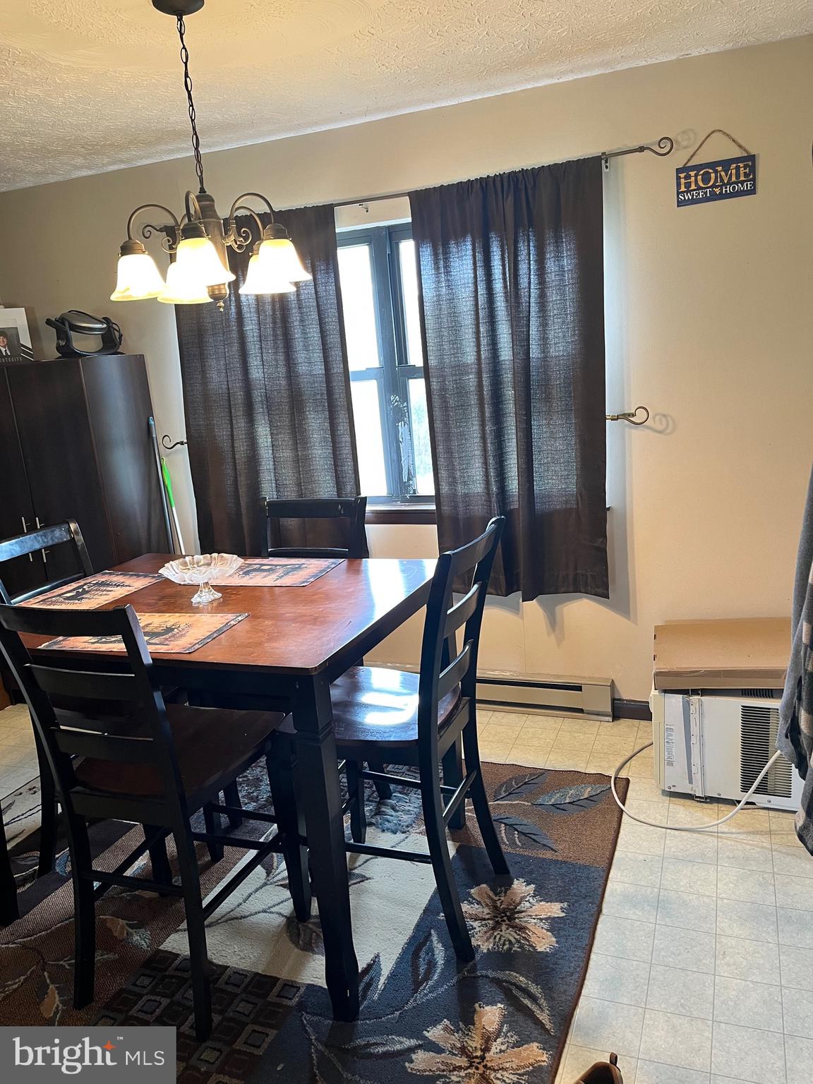 2166 Country Road Maysville, WV 26833 - Photo 16 of 54 a view of a dining room with furniture and window