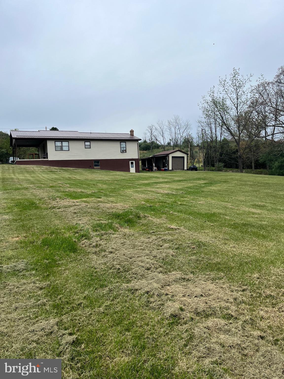 2166 Country Road Maysville, WV 26833 - Photo 32 of 54 a view of a big yard with a house