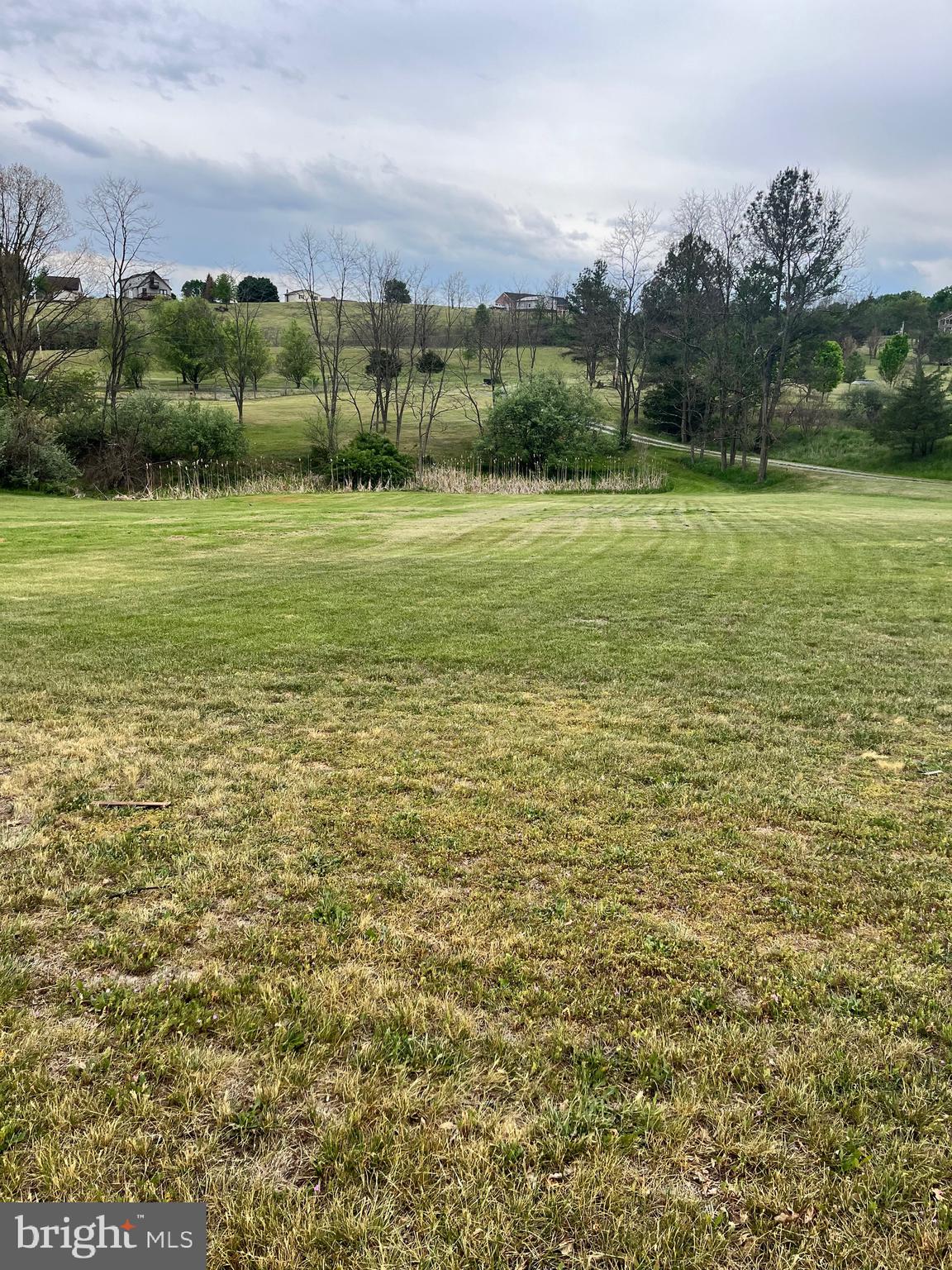 2166 Country Road Maysville, WV 26833 - Photo 40 of 54 a view of a field with an ocean