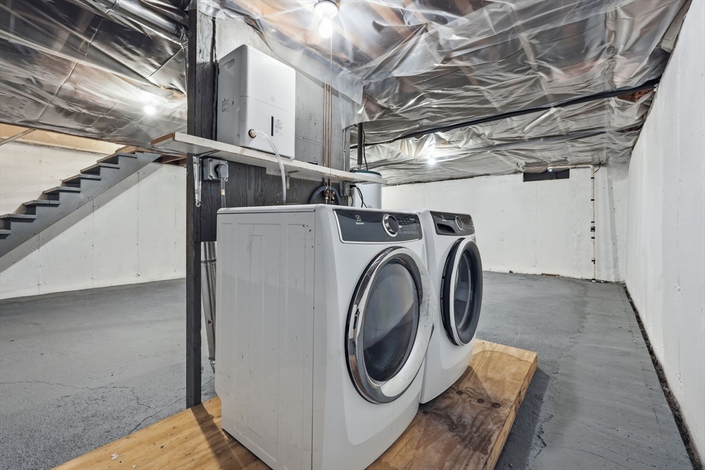 170 East Hadley Road, Unit 96 Amherst, MA 01002 - Photo 26 of 36 a utility room with dryer and washer