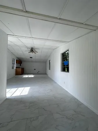 a view of a livingroom with a fireplace