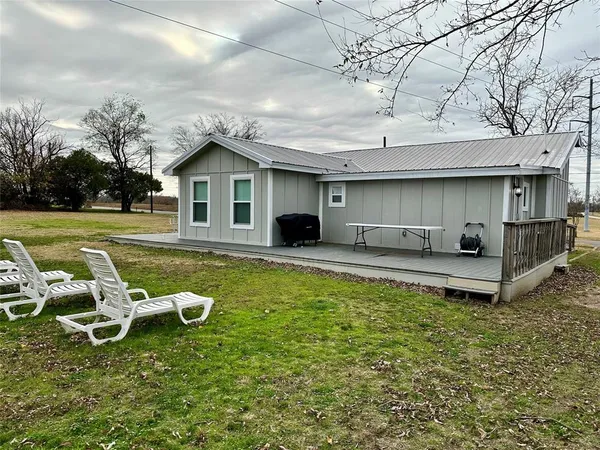 a house view with a garden space