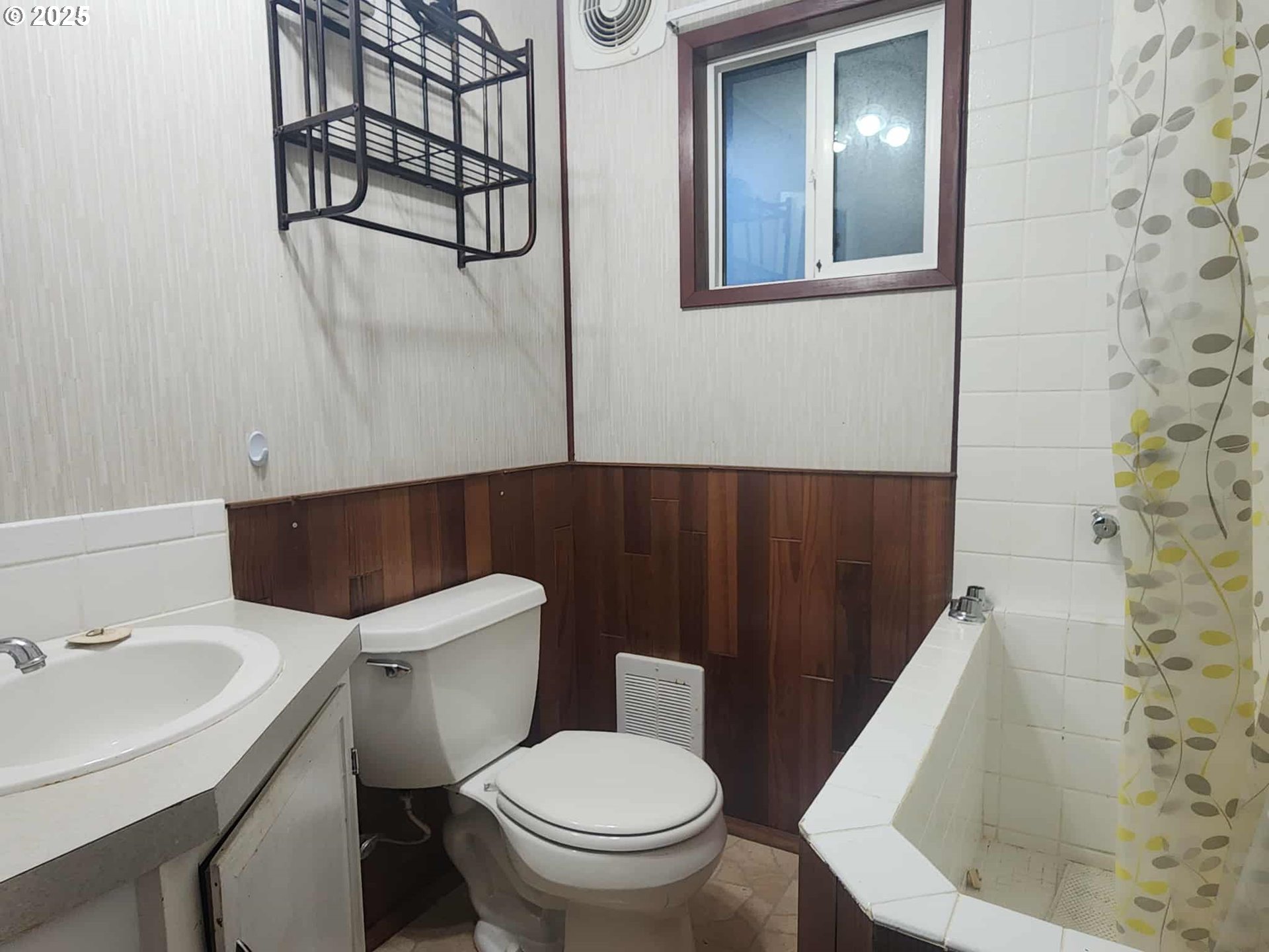 96015 Sun Lake Lane Lakeside, OR 97449 - Photo 40 of 46 a white toilet sitting next to a bathroom sink