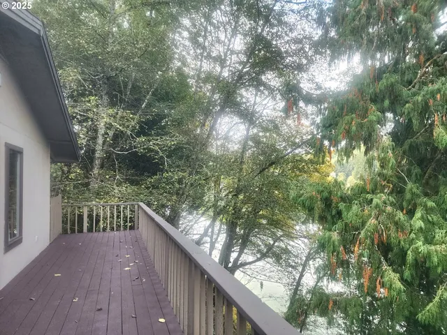 a view of balcony with furniture