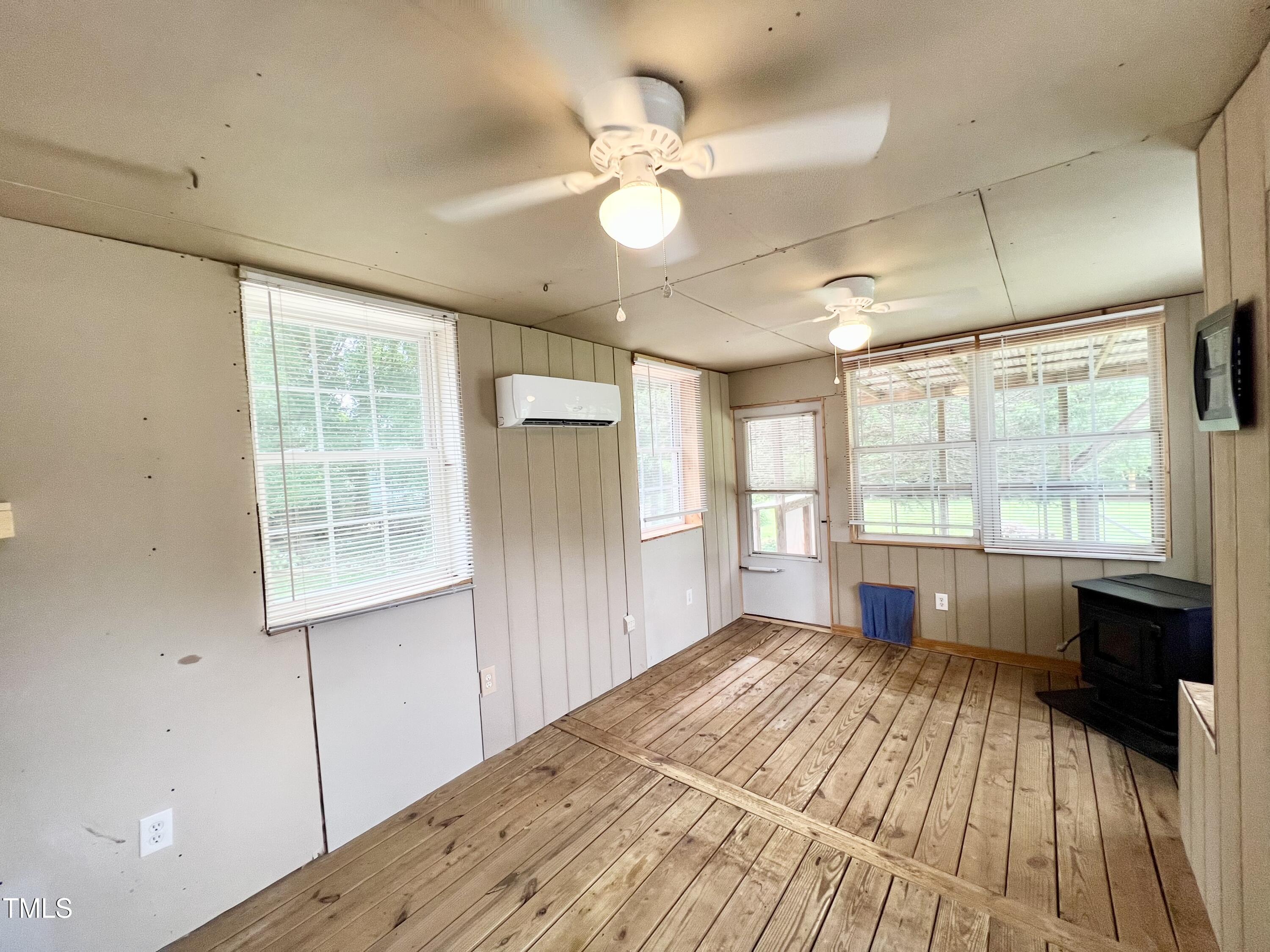 665 Christys Way Roxboro, NC 27574 - Photo 34 of 57 a view of a room with window and wooden floor