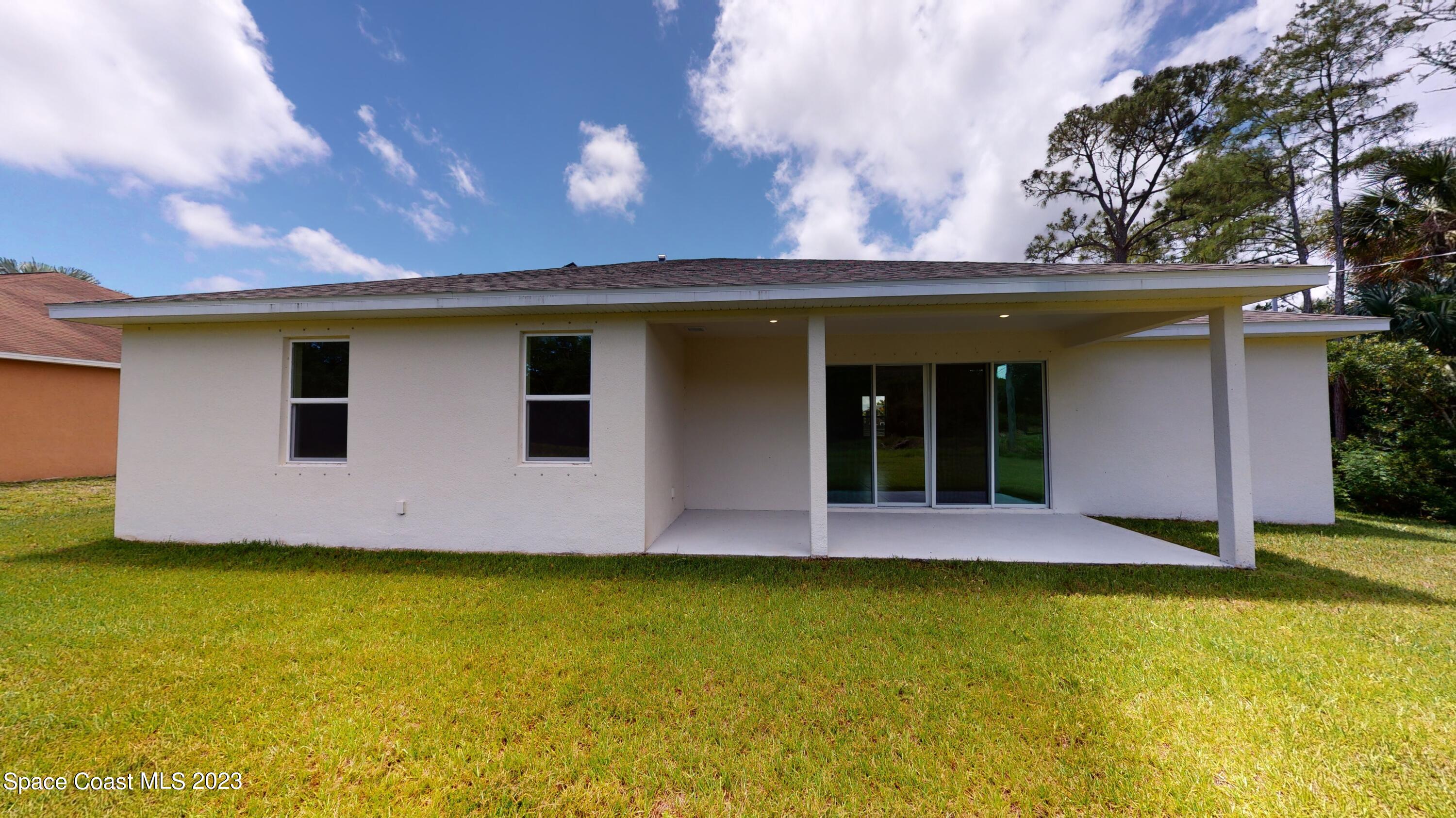 467 Scarlet Road Southwest Palm Bay, FL 32908 - Photo 16 of 18 018_Exterior Back