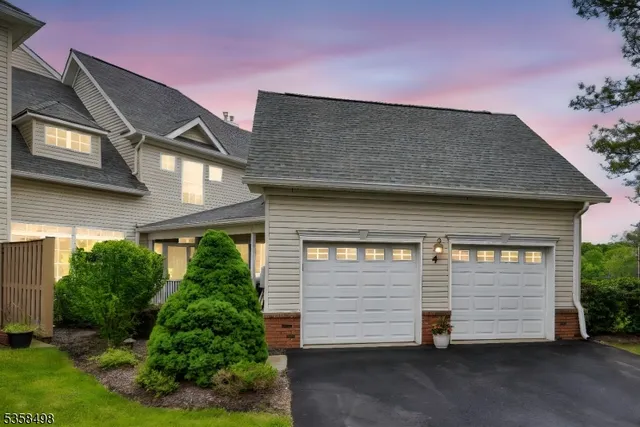 a view of a house with a garage