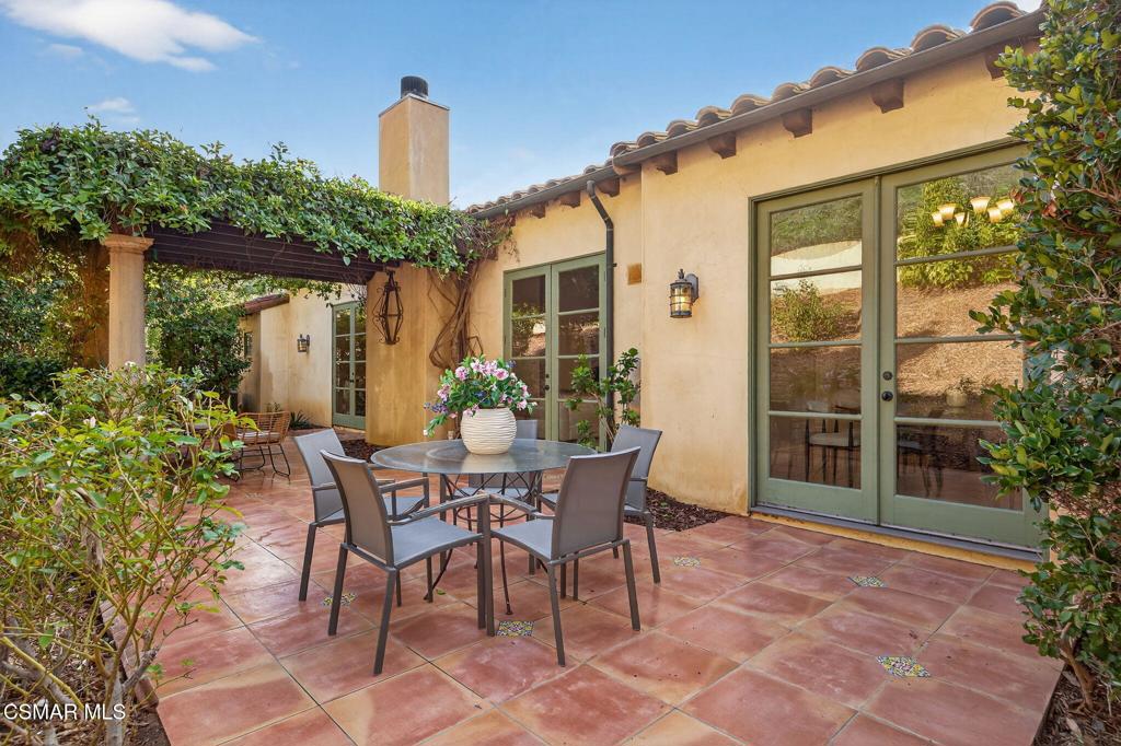 1560 Goodenough Road Fillmore, CA 93015 - Photo 43 of 76 a table and chairs in front of a house