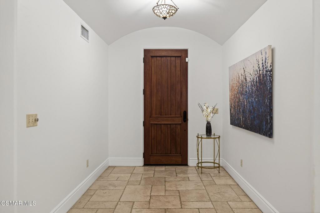 1560 Goodenough Road Fillmore, CA 93015 - Photo 58 of 76 a view of a hallway with wooden floor