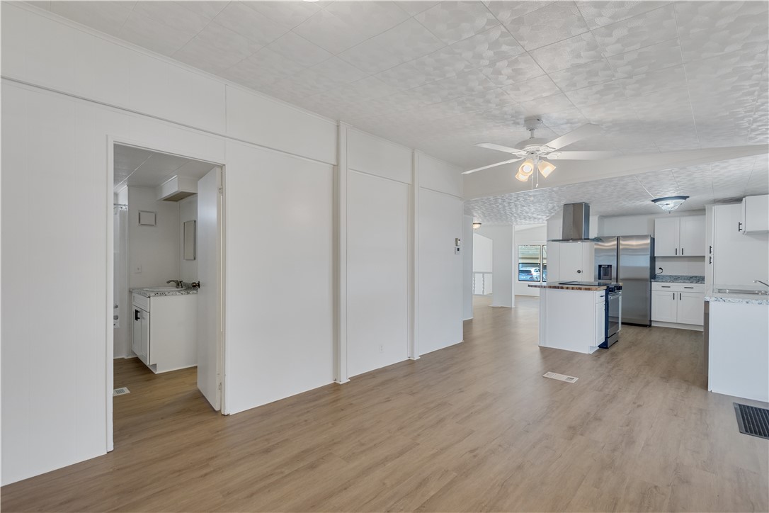 908 Oleander Circle Sebastian, FL 32976 - Photo 13 of 36 a view of a kitchen with a sink and a refrigerator