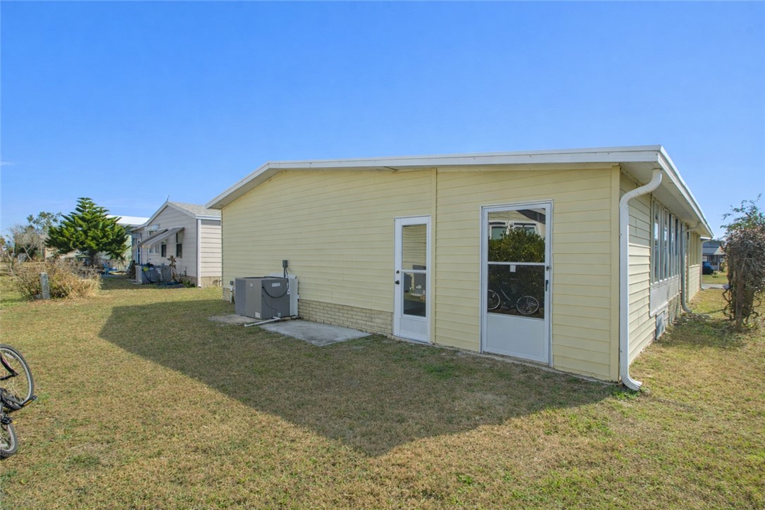 908 Oleander Circle Sebastian, FL 32976 - Photo 24 of 36 a view of a house with backyard