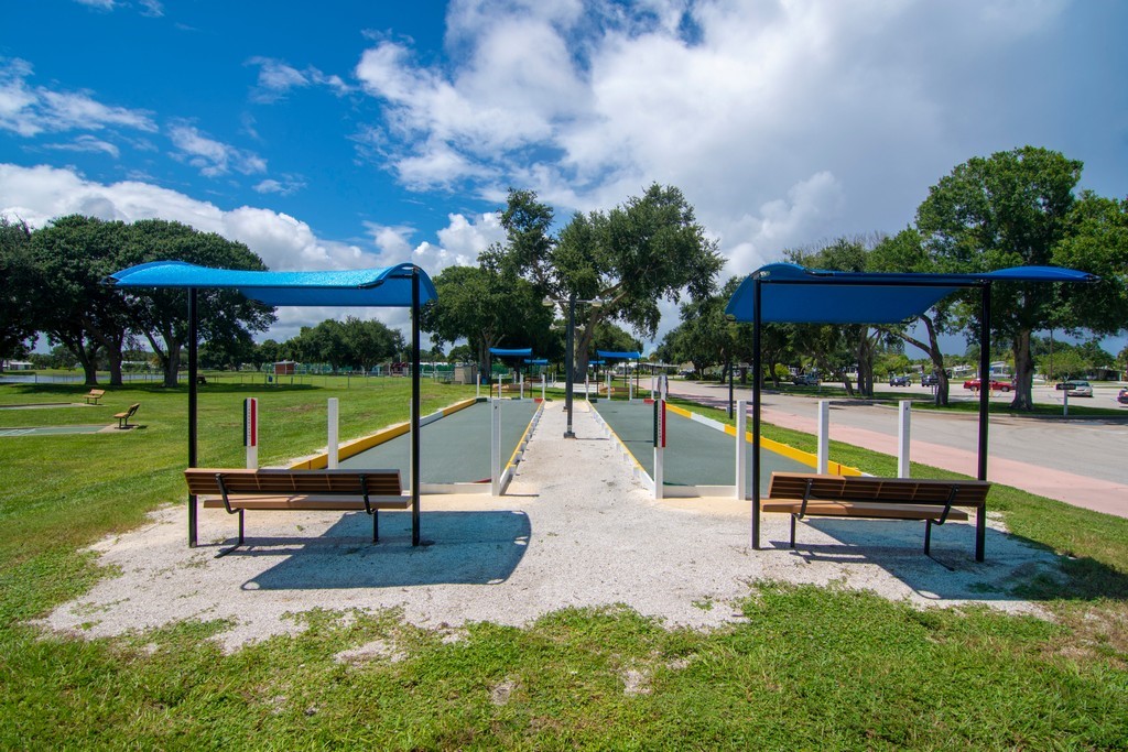 908 Oleander Circle Sebastian, FL 32976 - Photo 28 of 36 a park view of a park with slide