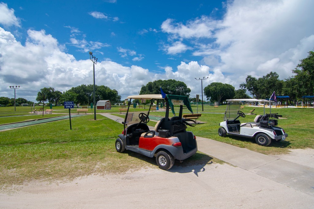 908 Oleander Circle Sebastian, FL 32976 - Photo 34 of 36 a view of a yard with furniture and garden