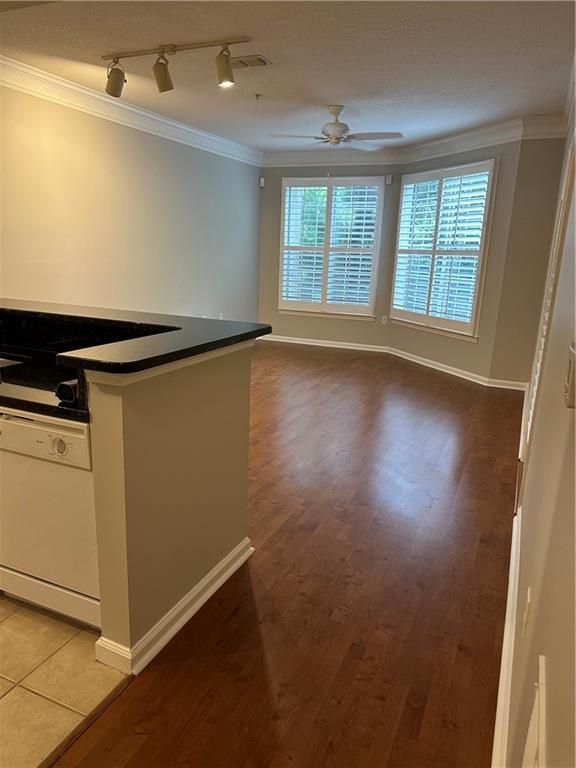 5208 Westchester Ridge Northeast Atlanta, GA 30329 - Photo 2 of 32 an empty room with wooden floor and windows