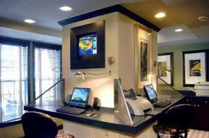 5208 Westchester Ridge Northeast Atlanta, GA 30329 - Photo 21 of 32 a room with furniture and a flat screen tv