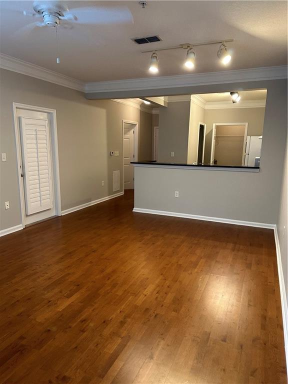 5208 Westchester Ridge Northeast Atlanta, GA 30329 - Photo 5 of 32 an empty room with wooden floor