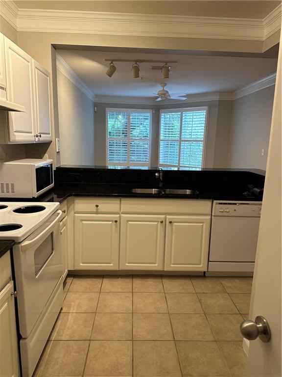 5208 Westchester Ridge Northeast Atlanta, GA 30329 - Photo 7 of 32 a utility room with cabinets