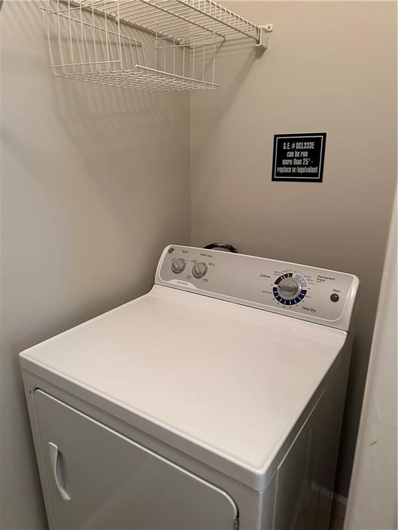 5208 Westchester Ridge Northeast Atlanta, GA 30329 - Photo 9 of 32 a close up view of a utility room with washer and dryer