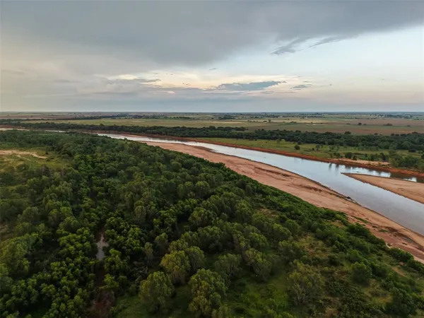 a view of an ocean and mountain