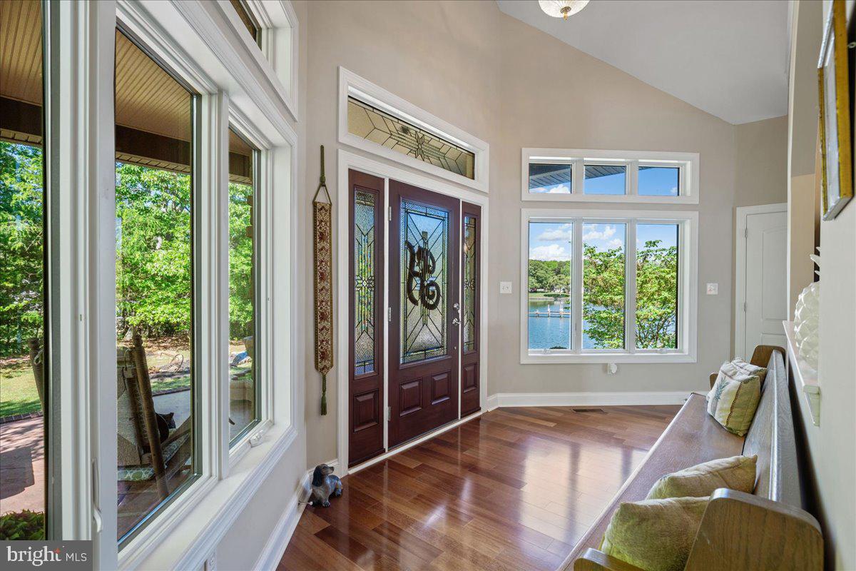 45216 Clarkes Landing Road Hollywood, MD 20636 - Photo 12 of 81 a view of a livingroom with furniture and front door
