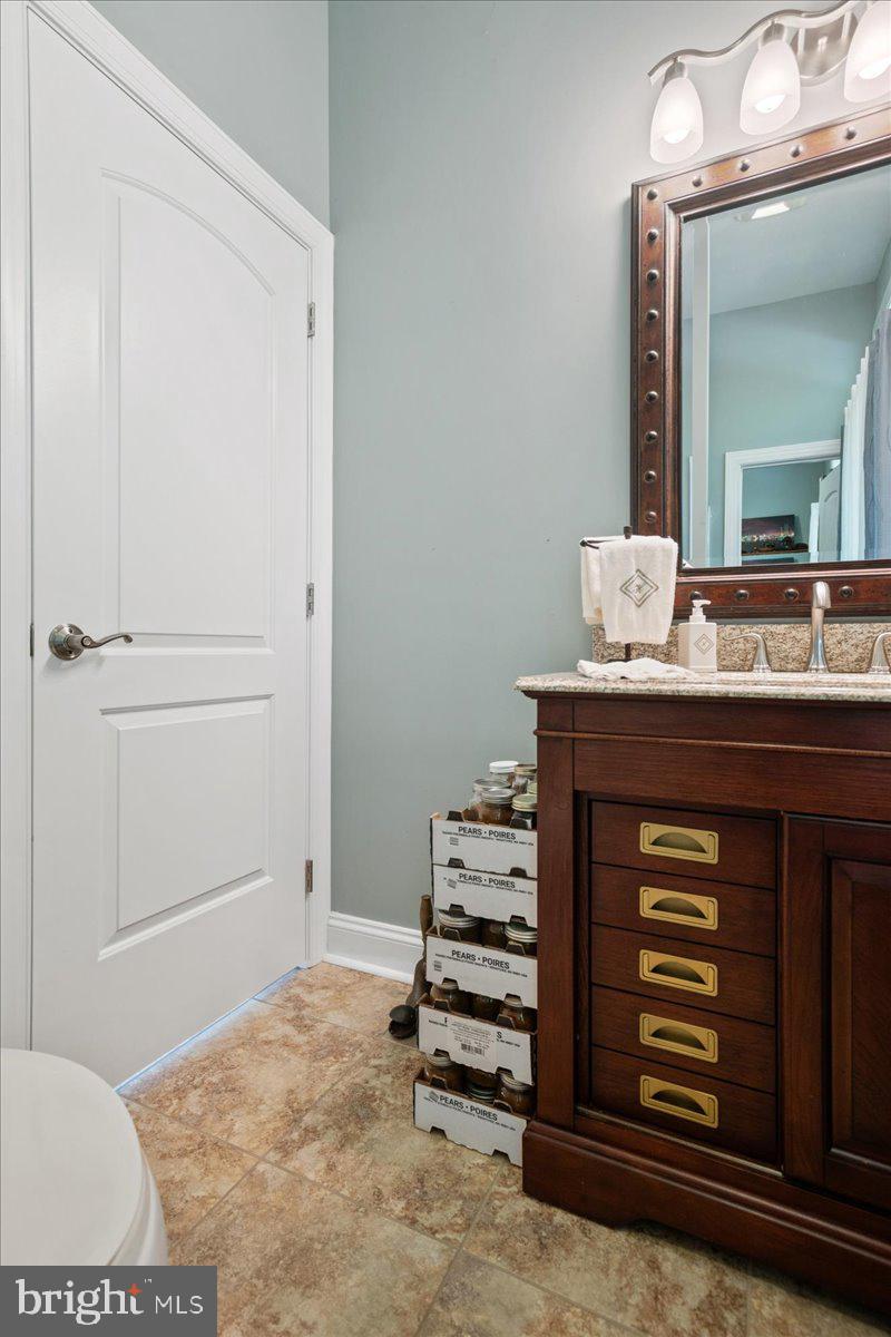 45216 Clarkes Landing Road Hollywood, MD 20636 - Photo 43 of 81 Bathroom between laundry-mud room and bedroom 4