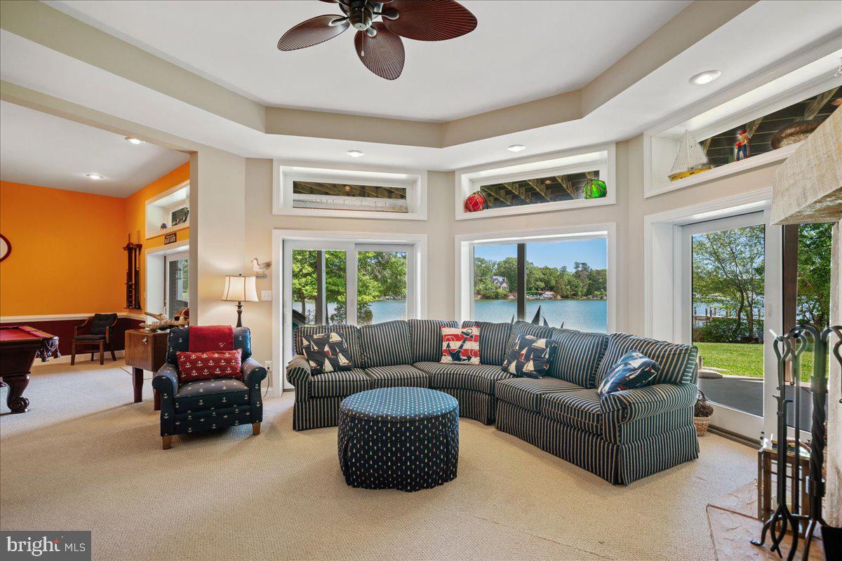 45216 Clarkes Landing Road Hollywood, MD 20636 - Photo 46 of 81 a living room with furniture and a large window