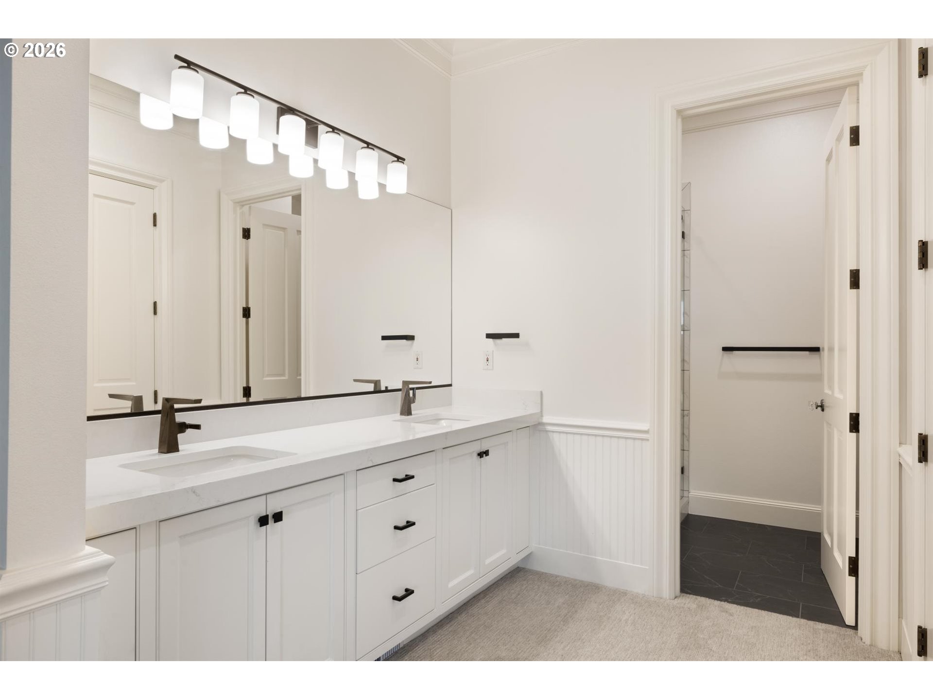 19600 Northwest 55th Avenue Ridgefield, WA 98642 - Photo 27 of 48 a bathroom with a sink a mirror and a shower