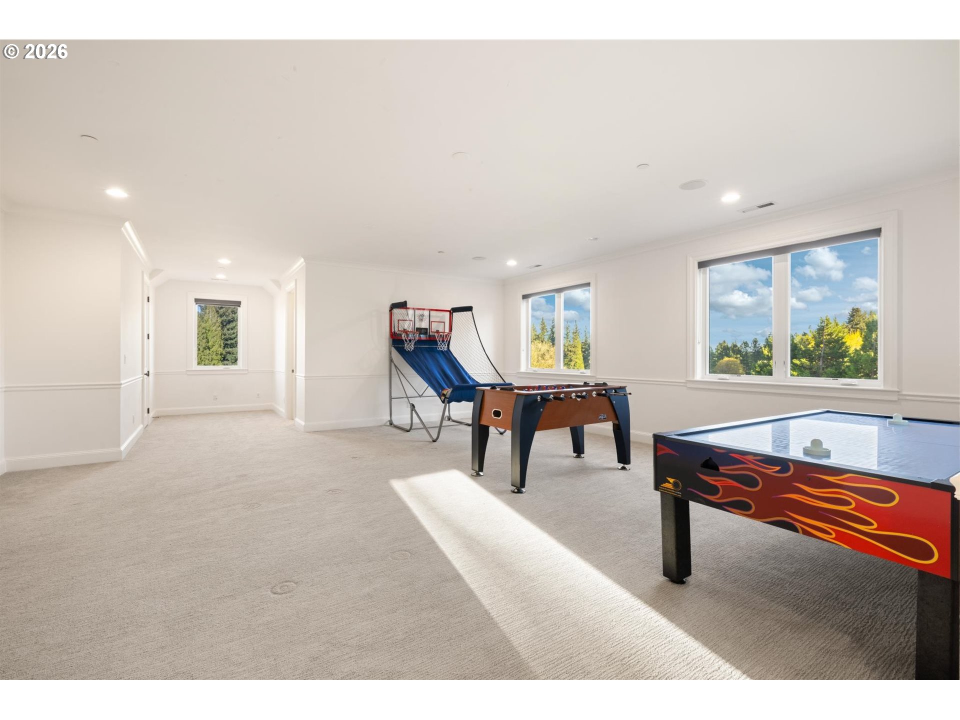 19600 Northwest 55th Avenue Ridgefield, WA 98642 - Photo 32 of 48 a living room with furniture pool table and windows