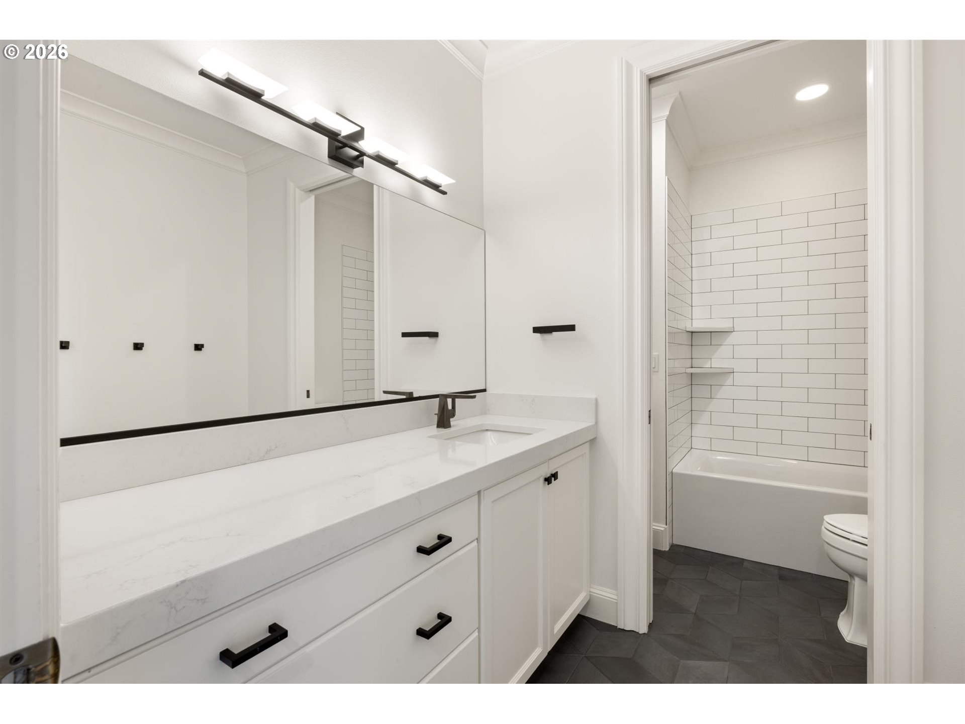 19600 Northwest 55th Avenue Ridgefield, WA 98642 - Photo 34 of 48 a bathroom with a sink a toilet and a shower
