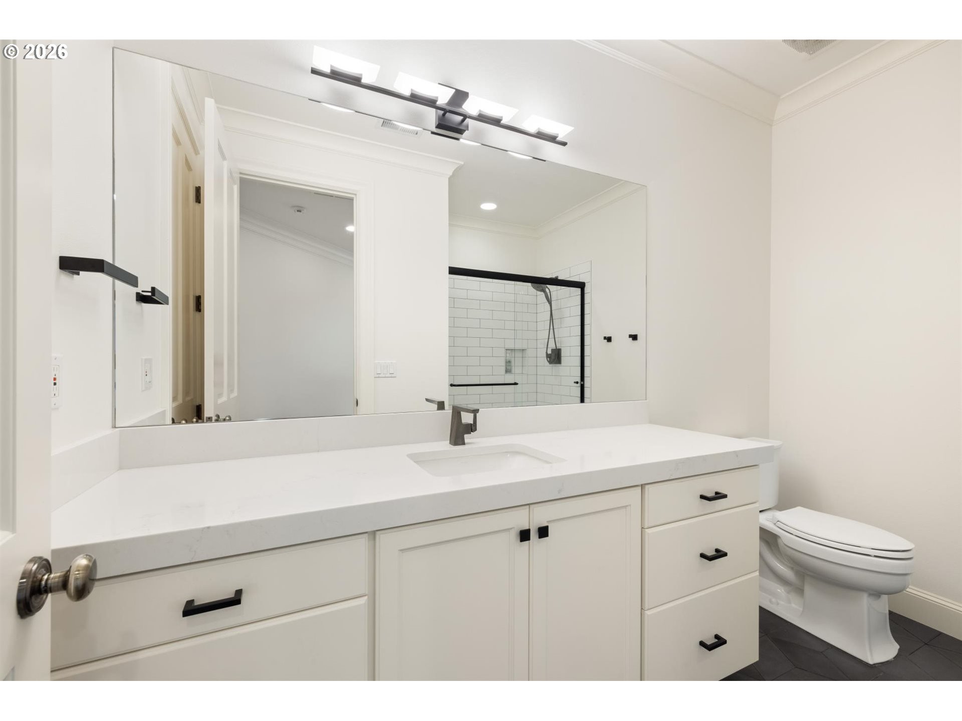19600 Northwest 55th Avenue Ridgefield, WA 98642 - Photo 39 of 48 a bathroom with a sink a toilet and a mirror