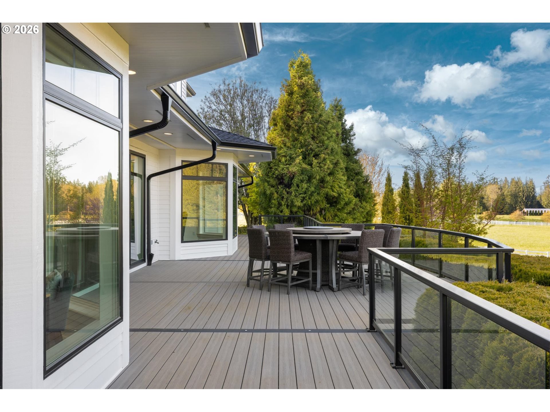 19600 Northwest 55th Avenue Ridgefield, WA 98642 - Photo 45 of 48 a view of a chairs and table on the balcony