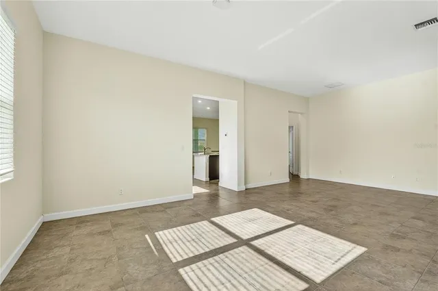 an empty room with an entryway